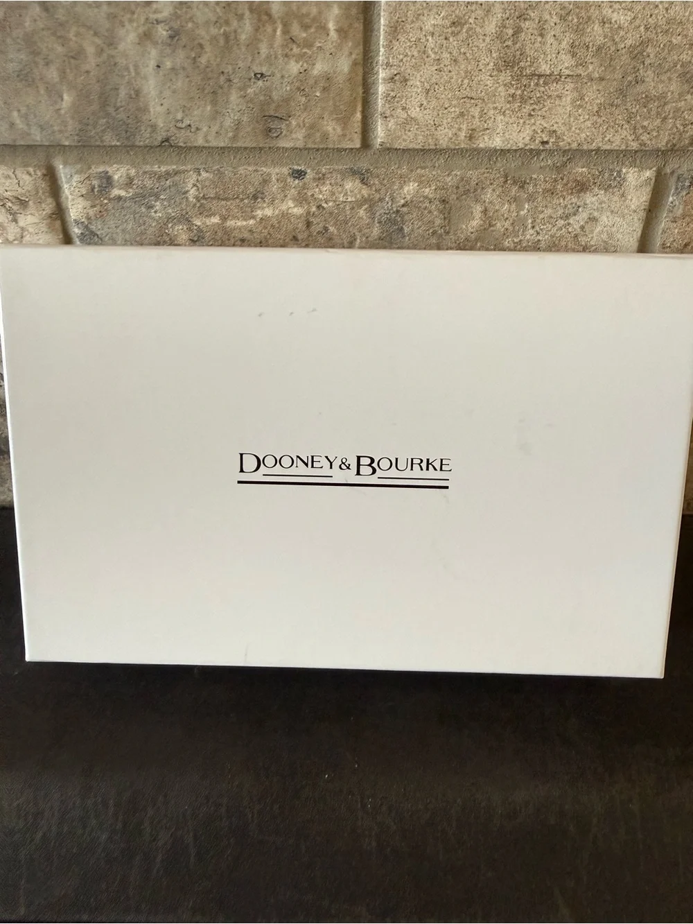 Dooney & Bourke Black Zip-Around Continental Wallet with Logo Patch